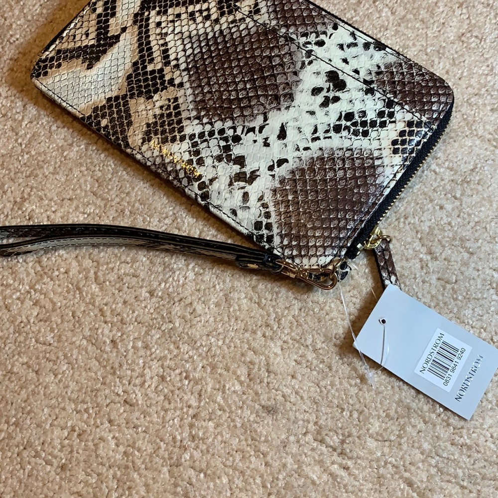 Snakeskin print wristlet